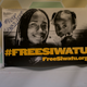 A sign at the Cass Commons in Detroit, where Siwatu-Salama Ra worked before incarceration.